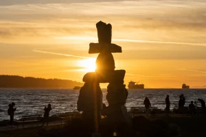 Inukshuk stone sculpture in the sunset